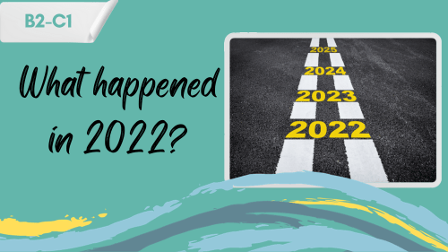 a road with years written on it and a slogan - what happened in 2022?