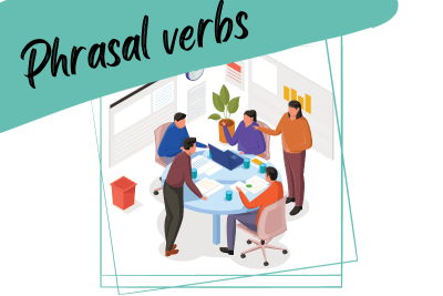 colleagues at a Business Meeting and the words "phrasal verbs"