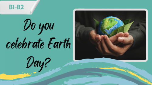 world earth day concept. a man holding a globe and a slogan - do you celebrate earth's day?