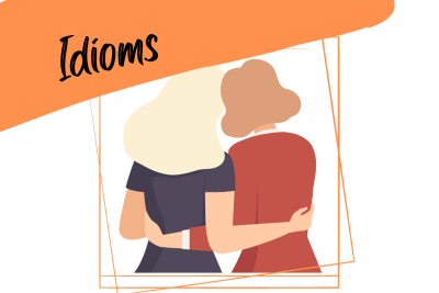 2 women hugging and the word "idioms"