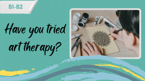 a person drawing a mandala symbol and a slogan - have you tried art therapy?